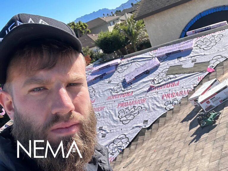 Roofer on a roof during an underlayment install