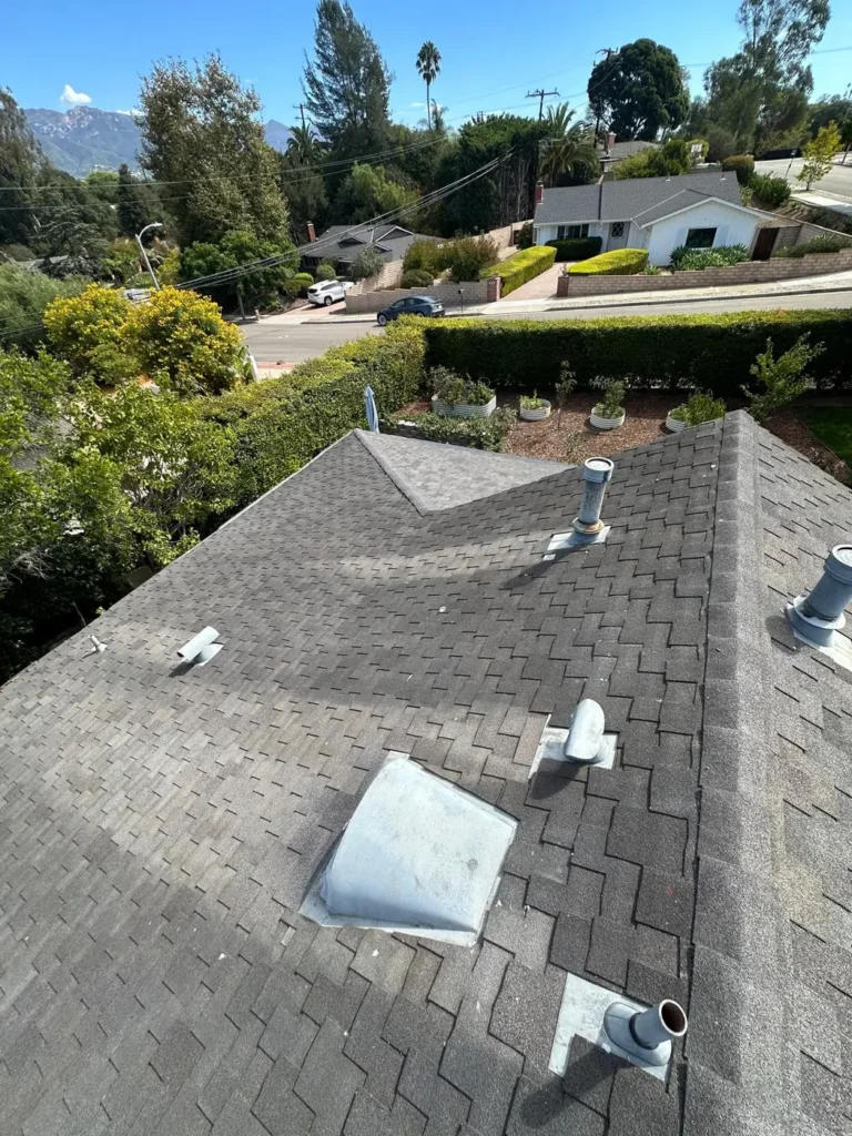 Finished shingle roof with new vents by NEMA Roofing